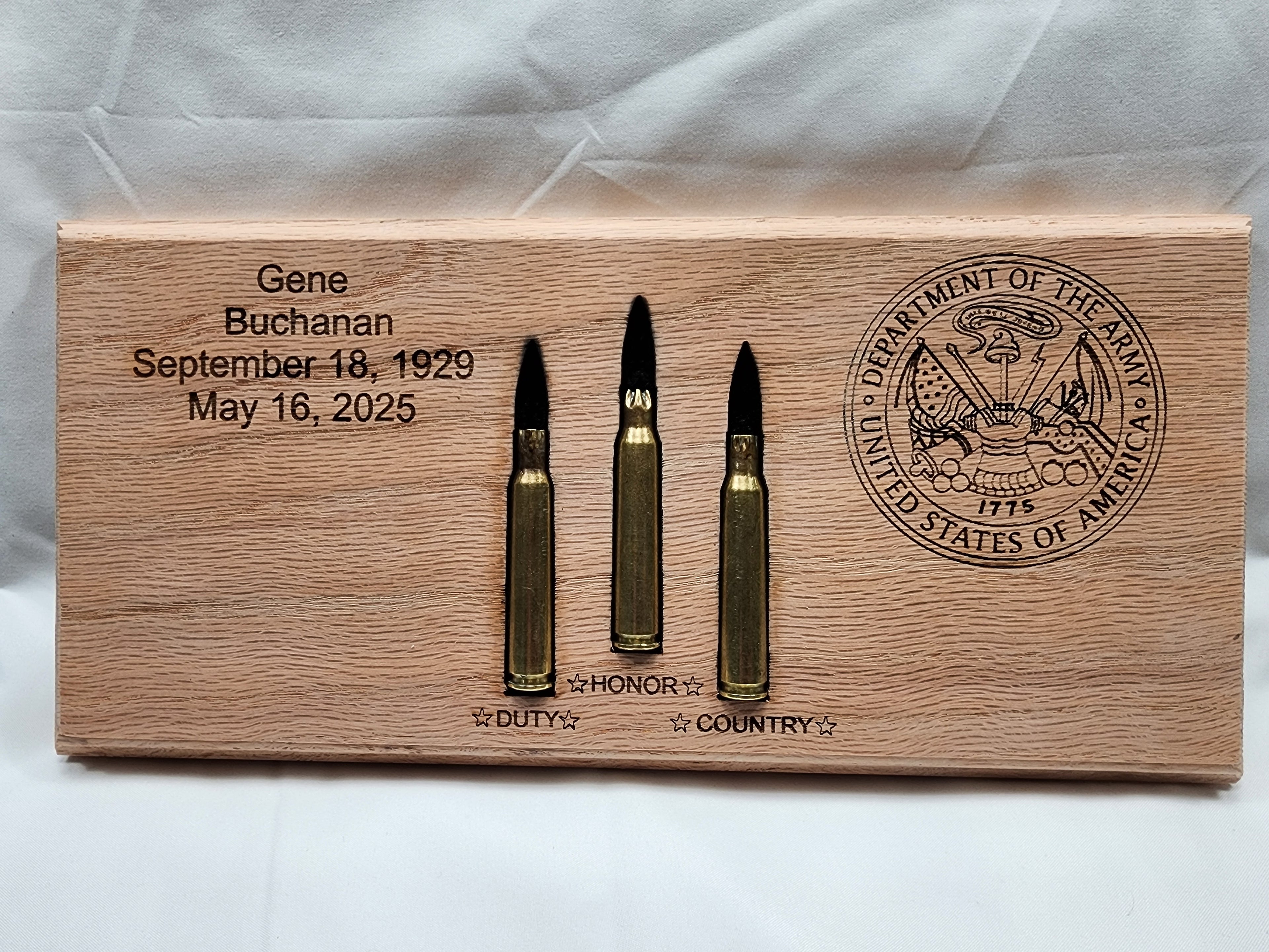 Plaque to display rounds received at a Veteran's funeral