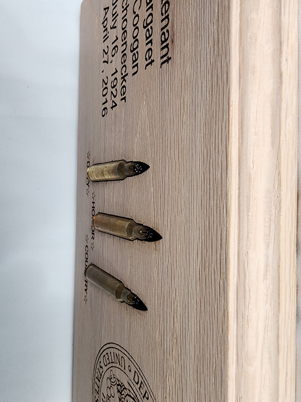 Plaque to display rounds received at a Veteran's funeral